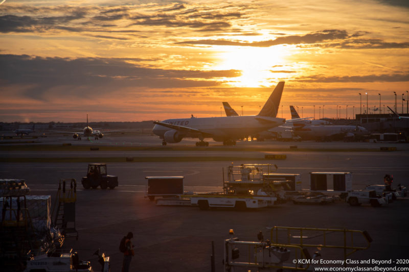 United Airlines Boegin 777-200ER taxiing into the sunset - Image, Economy Class and Beyond