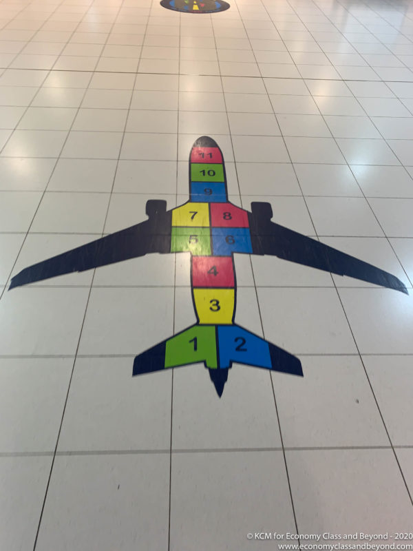 a colorful airplane on a tile floor