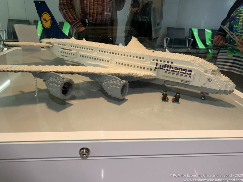 a model of a plane in a glass case