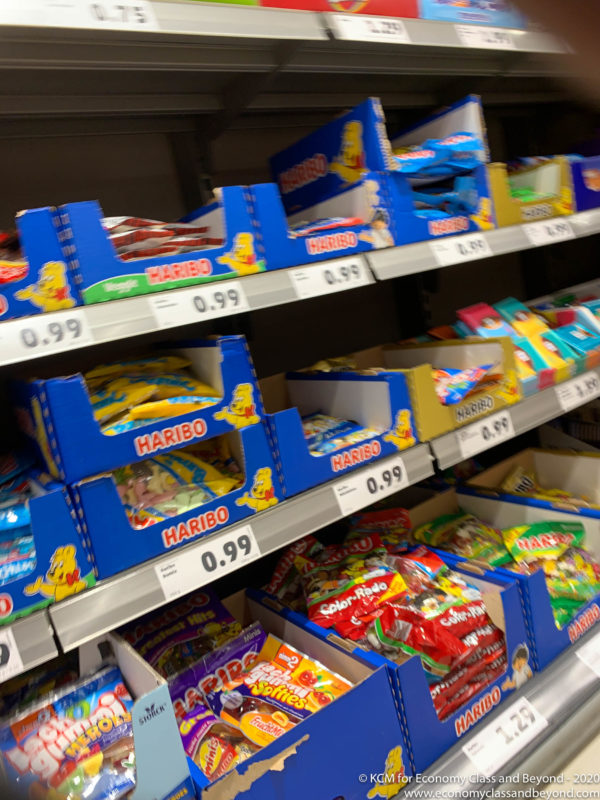 a shelf with candy in boxes