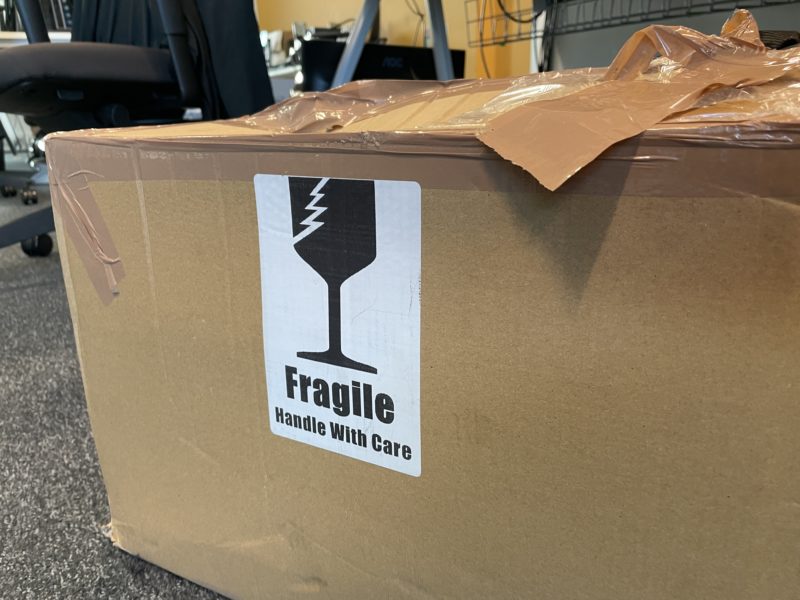 a cardboard box with a fragile sticker on it
