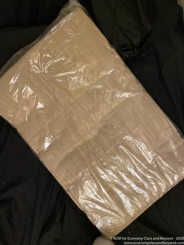 a plastic bag on a black surface