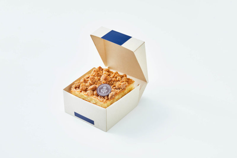 a square piece of food in a box