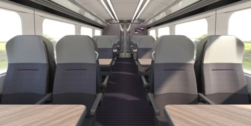 a train with seats and a table