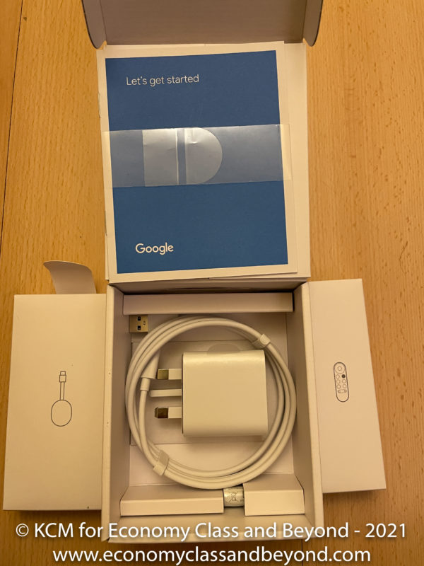 a box with a charger and a cable