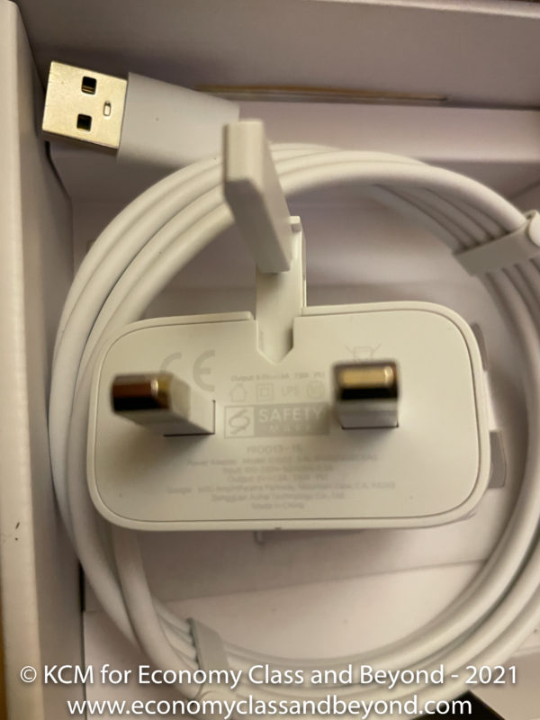 a white electrical plug in box