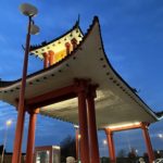 a pagoda with red pillars