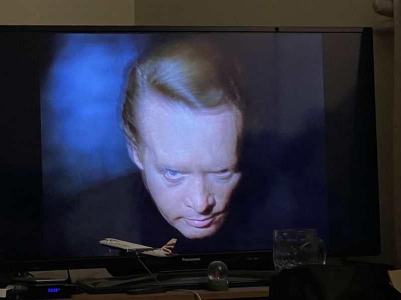 a tv screen with a man's face on it