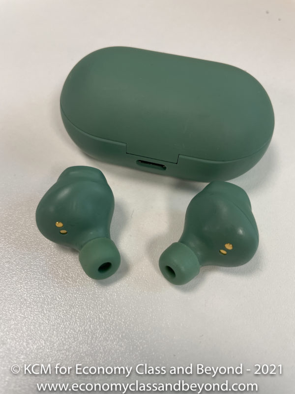 a green earbuds and a case