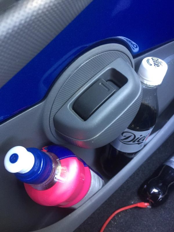 a drink bottles in a car