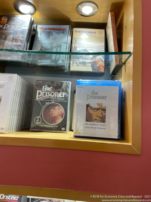 a shelf with dvd cases