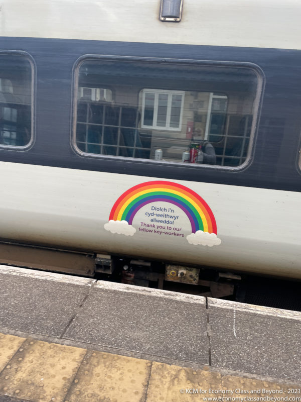 a train with rainbow sticker on the side
