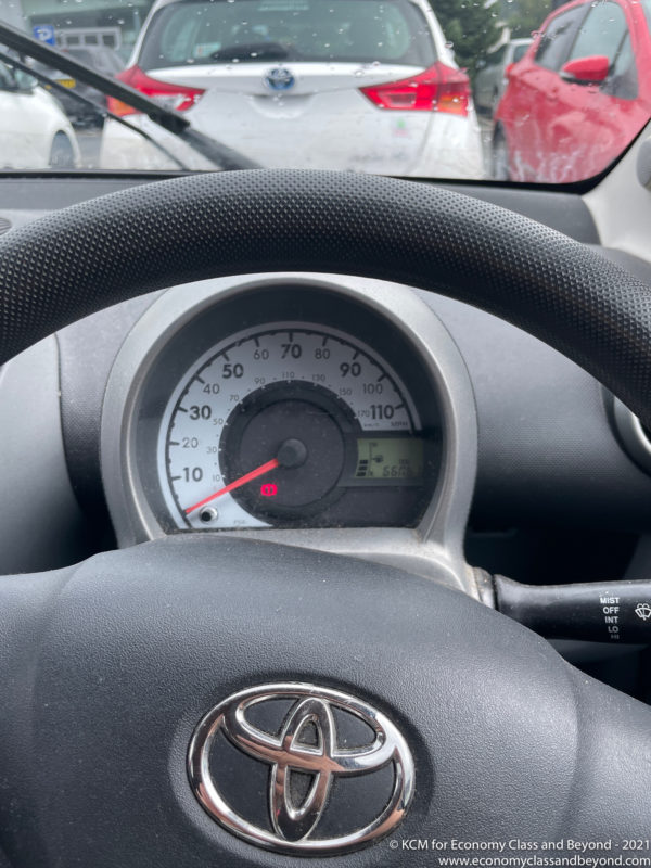 a steering wheel and dash of a car
