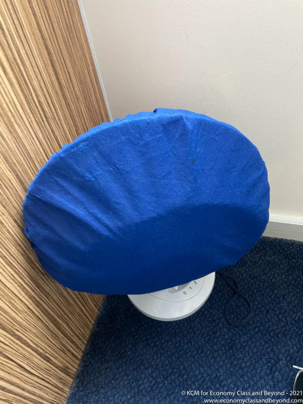 a blue cover on a chair