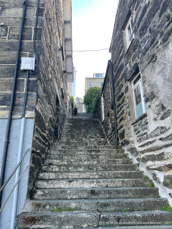 a stone stairs leading up to a building