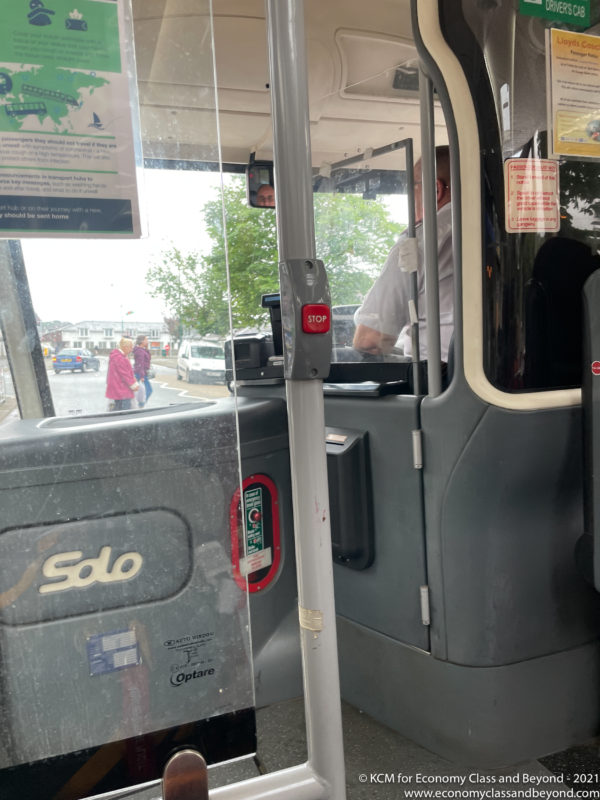 a man standing in a bus