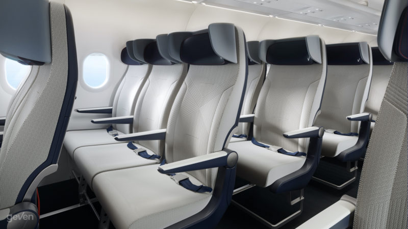 a row of white seats in a plane