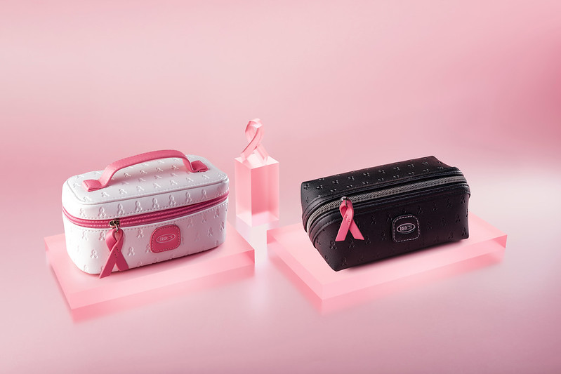 a pink and black cosmetic bags