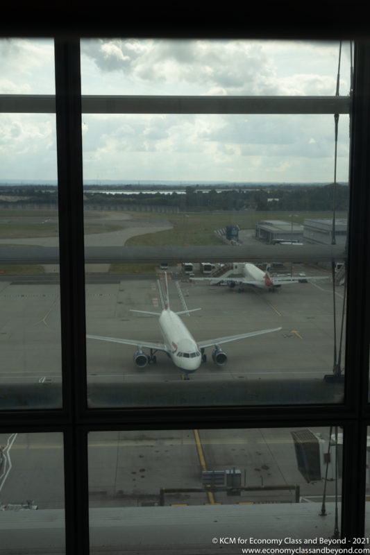 a view of airplanes from a window
