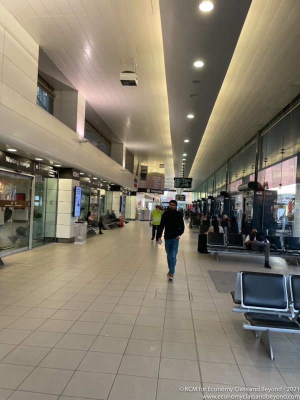 a man walking in a terminal