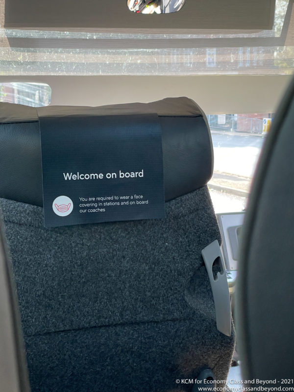 a seat with a sign on it