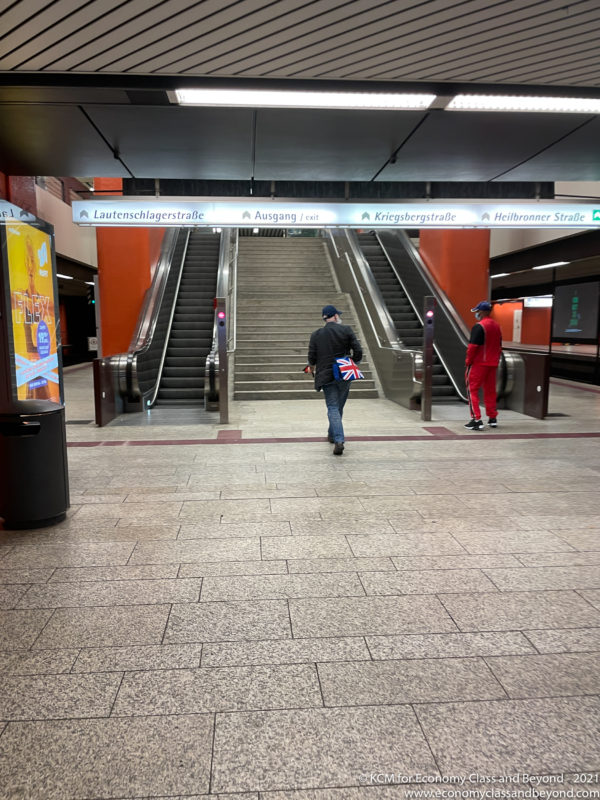 people walking in a subway station