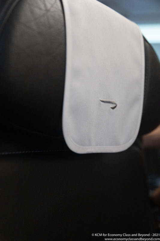 a white object on a black seat