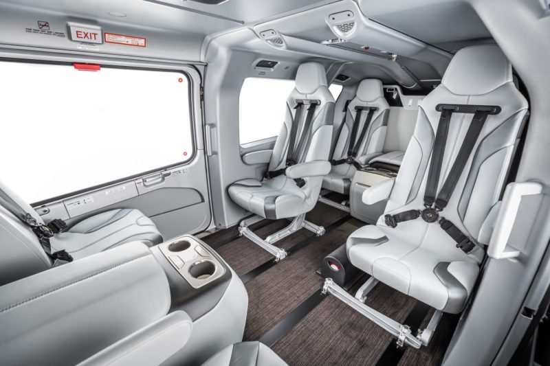 the inside of a vehicle with seats