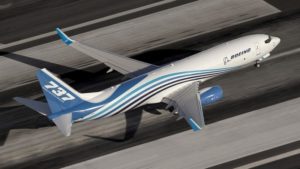 a blue and white airplane taking off