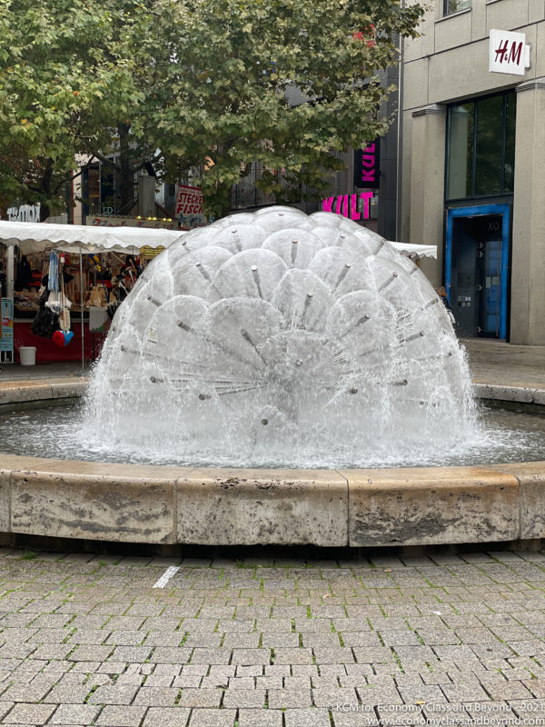a water fountain in a city