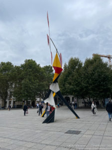 a sculpture in a plaza