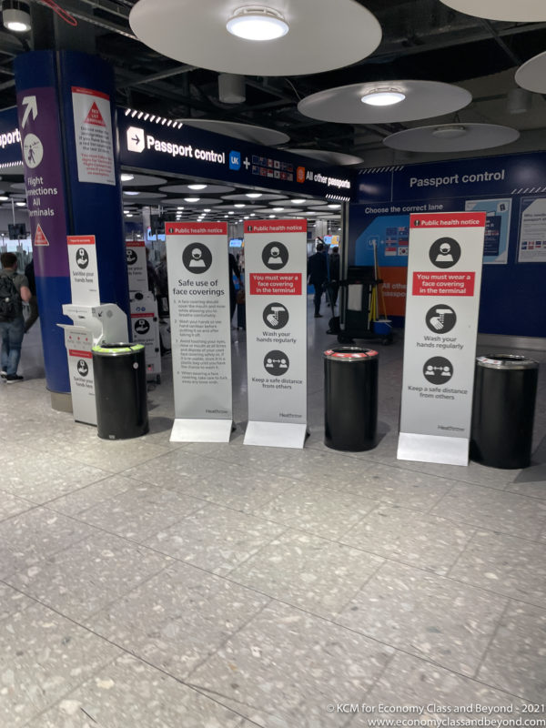 a group of signs in a terminal