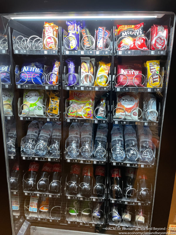 a vending machine with different snacks and drinks