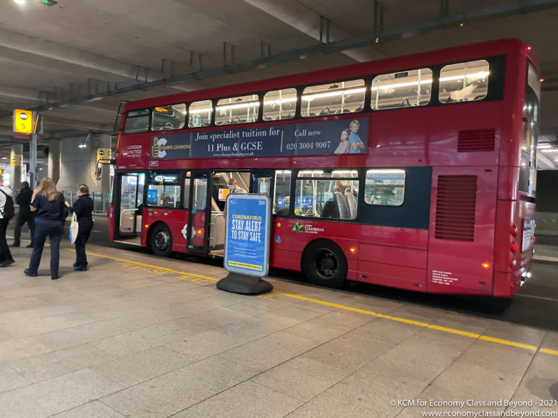 a double decker bus in a station