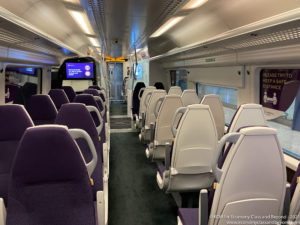 a train with purple seats