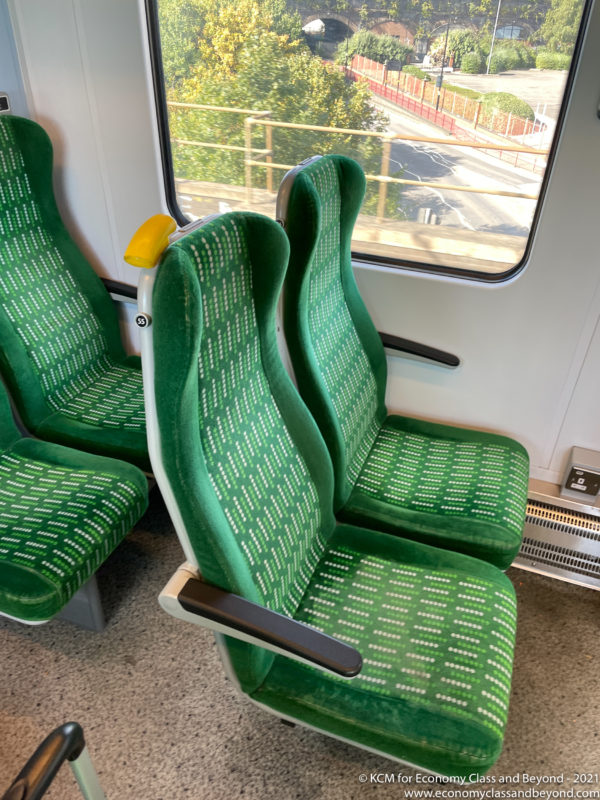 green seats on a train