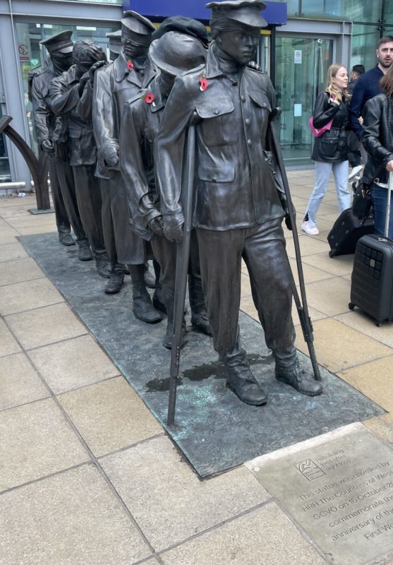 a statue of a soldier in a line