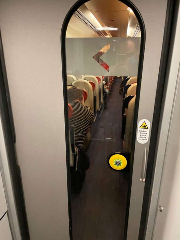 a door with a window on a train