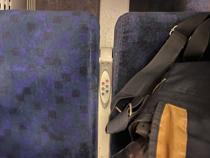 a bag next to a seat