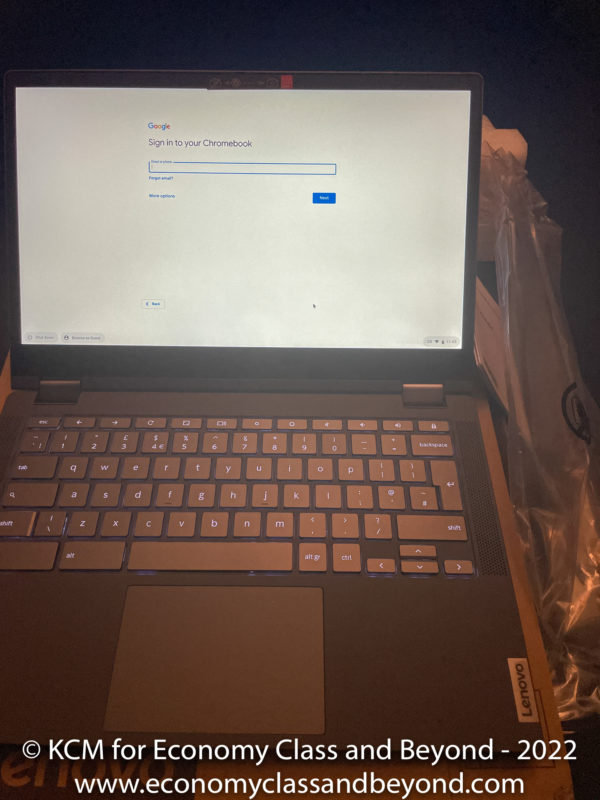 a laptop with a sign in the screen
