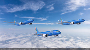 a group of blue airplanes in the sky