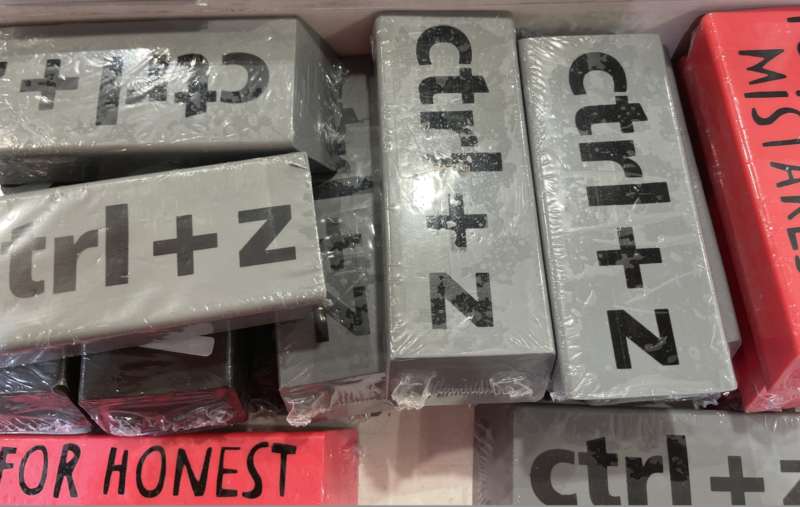a group of grey boxes with black letters