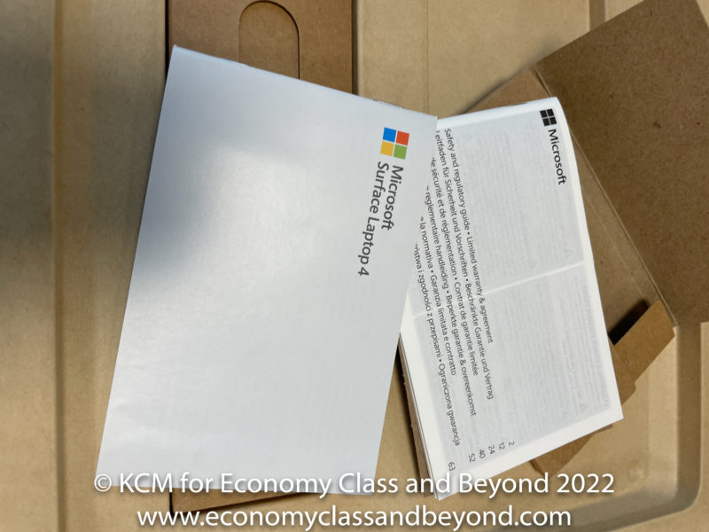 a box with a white envelope and a white box with a white text