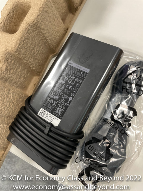 a black electrical device in a plastic bag