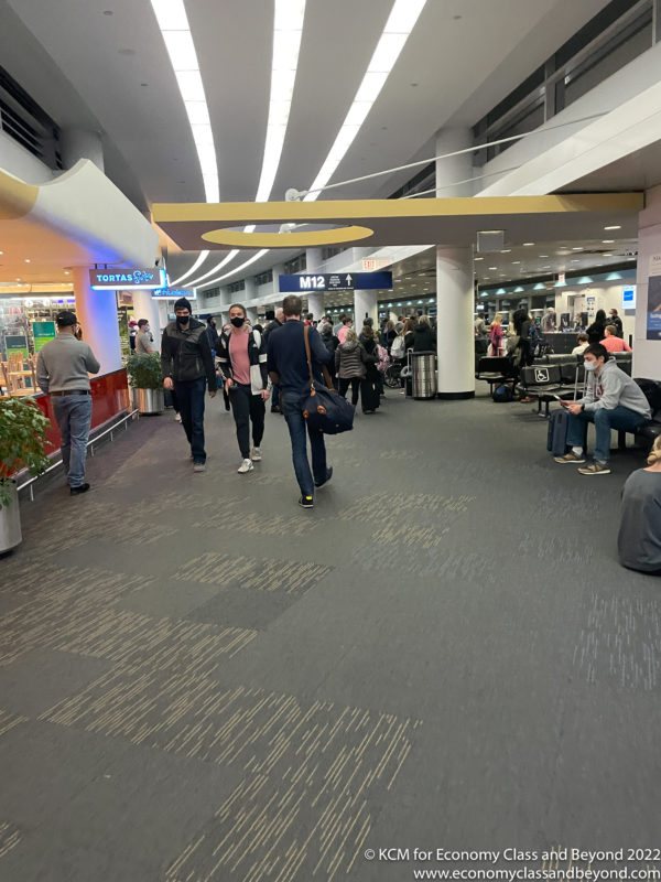 people walking in a terminal