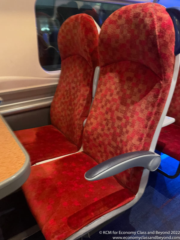 a red seats on a train