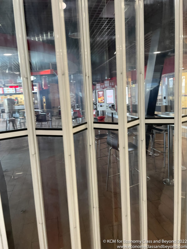 a glass wall with bars