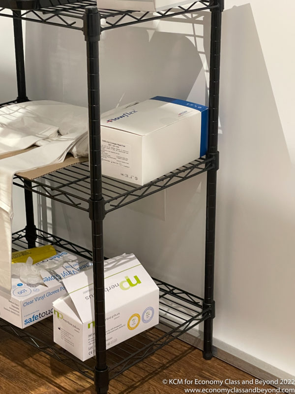 a shelf with boxes on it