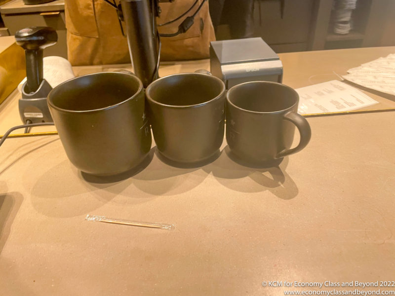 a group of coffee mugs on a table