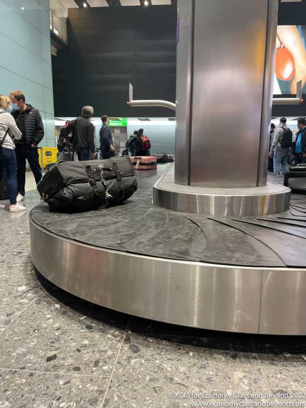 a luggage carousel at an airport